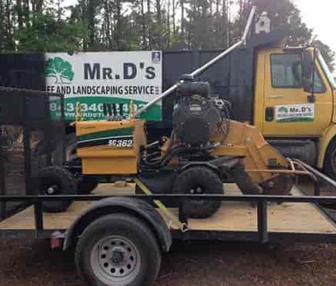 Stump Removal Truck — Myrtle Beach, SC — Mr. D's Tree & Landscaping Service LLC Stump Removal Truck — Myrtle Beach, SC — Mr. D's Tree & Landscaping Service LLC