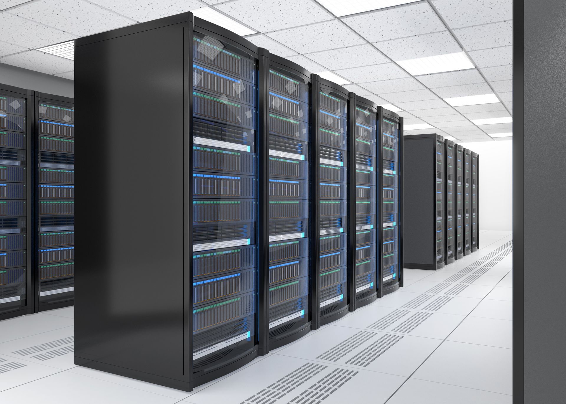 Rows of black server racks with blue lights in a bright data center corridor