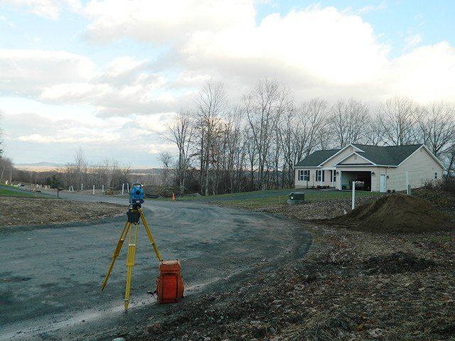 View Of Theodolite On Road — Greenwich, NY — Corner Post Land Surveying