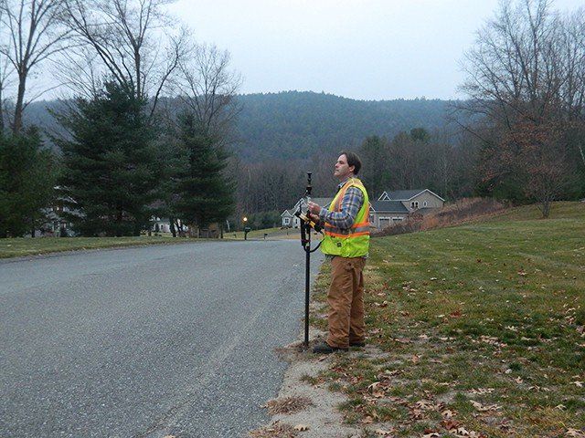 Man Working With Survey Equipment — Greenwich, NY — Corner Post Land Surveying