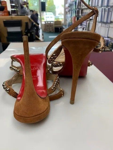 Pair of Women Sandals With Red Sole — St. Louis, MO — Cobblestone Quality Shoe Repair