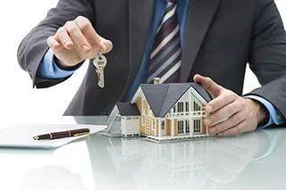 Homeowners Insurance Broker Holding Keys