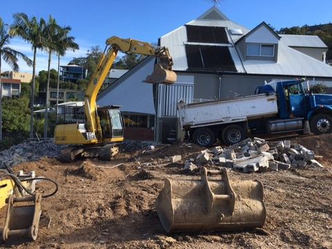 soil being  removed using machine
