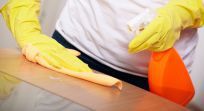 One of our professional cleaners in Honolulu, HI polishing a table