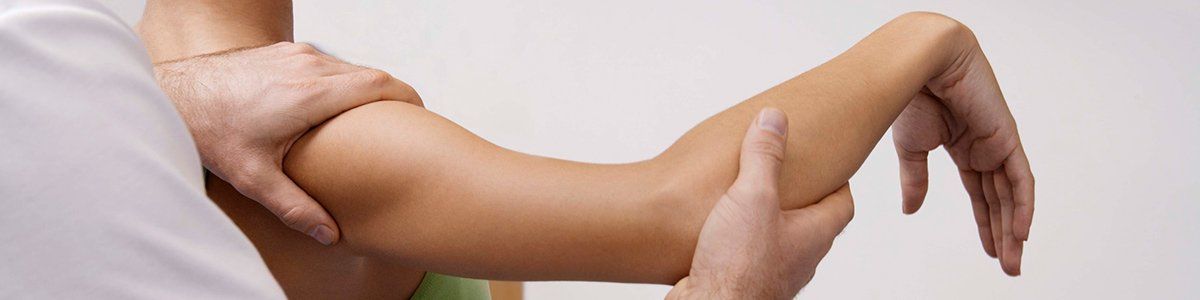 Osteopathic treatment on the arm in New Town Osteopathic treatment on the arm in New Town