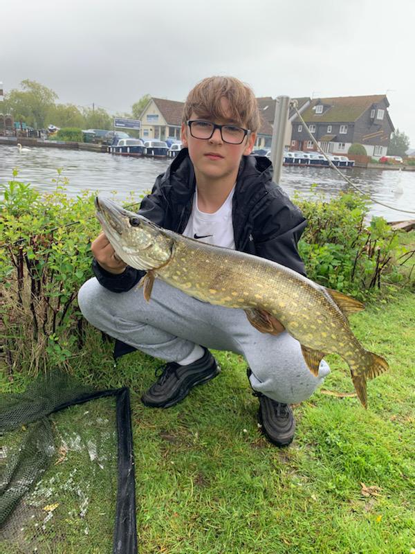 teenager showing off his pike to camera