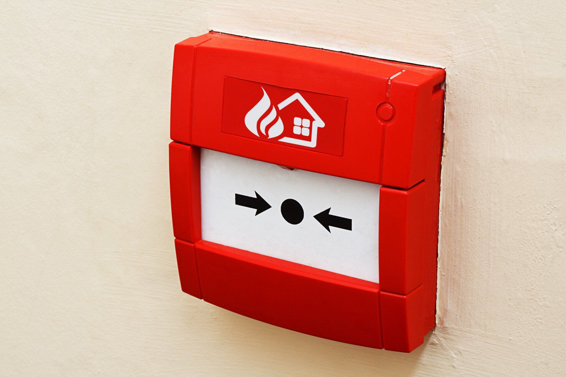 man fixing alarm