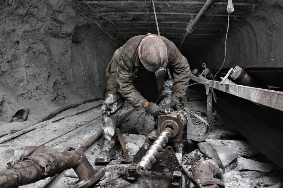 contractor working on the installation of rail tracks