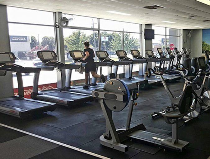 man running in the gym