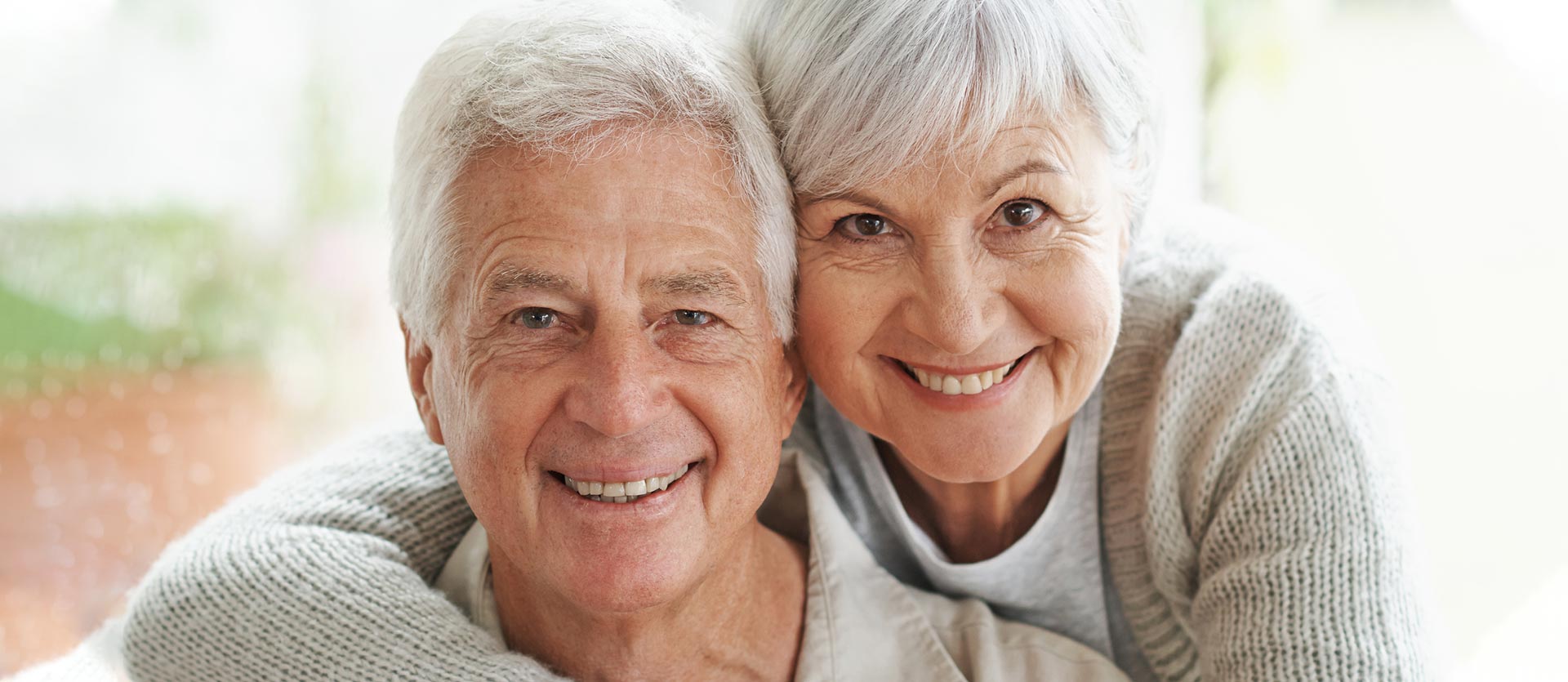 elder couple smiling