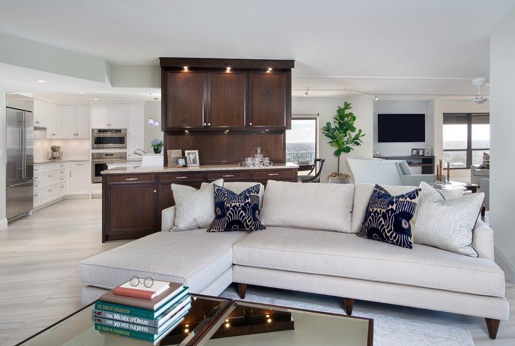 A living room with a couch and a coffee table.