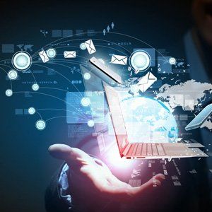 A image with a hand, laptop, and mail icons