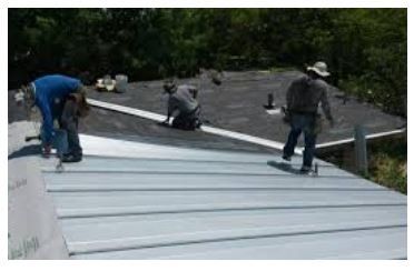 Roof Repair — Workers on the Roof in San Antonio, TX