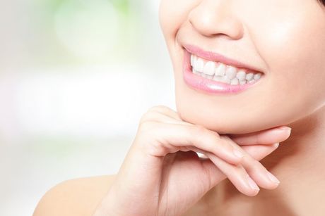 woman's chin with smiling mouth