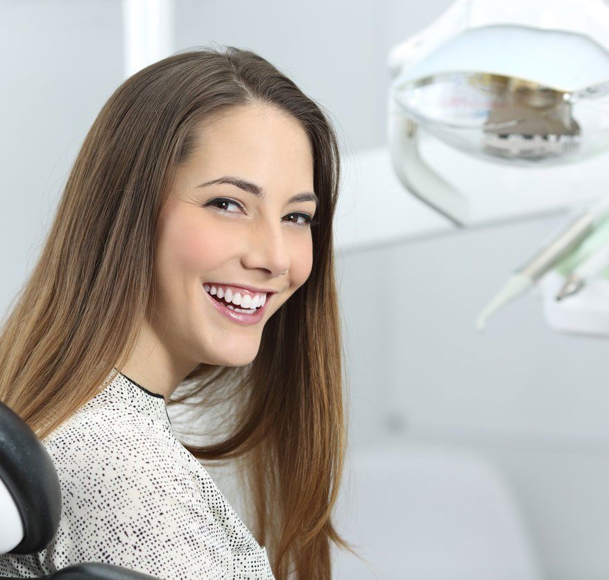 woman smiling at dentist office