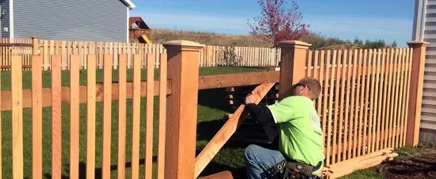 Man Working in Fence — Madison, WI — Leading Edge Fences LLC Man Working in Fence — Madison, WI — Leading Edge Fences LLC
