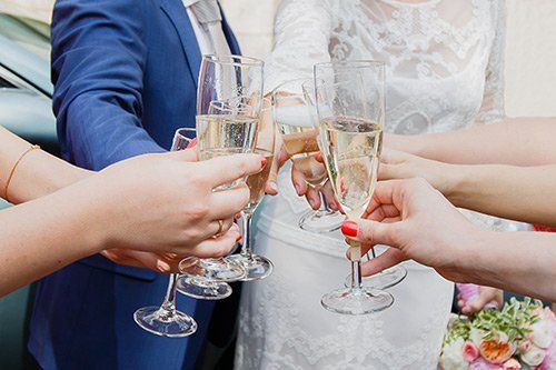 Young People Toasting with Champagne Glasses