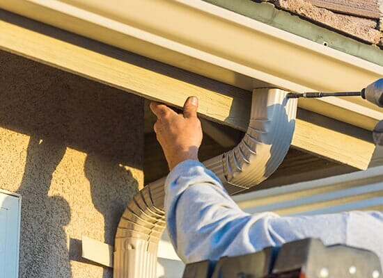 Repairing Gutter and Ajusting — Gutter installation in Chicago, Illinois Repairing Gutter and Ajusting — Gutter installation in Chicago, Illinois