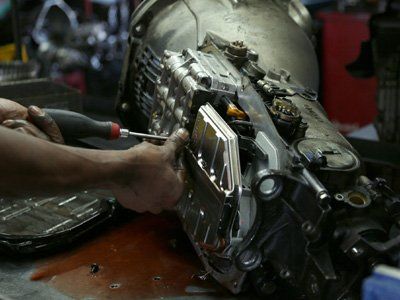 Transmission — Mechanic Repairing Car Transmission in Rochester, MN Transmission — Mechanic Repairing Car Transmission in Rochester, MN