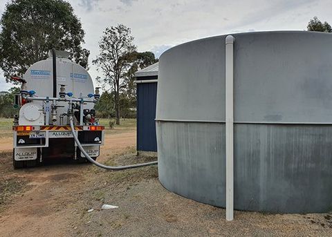 Water Truck Filling Up Tank — Water Delivery in Kearsley, NSW Water Truck Filling Up Tank — Water Delivery in Kearsley, NSW