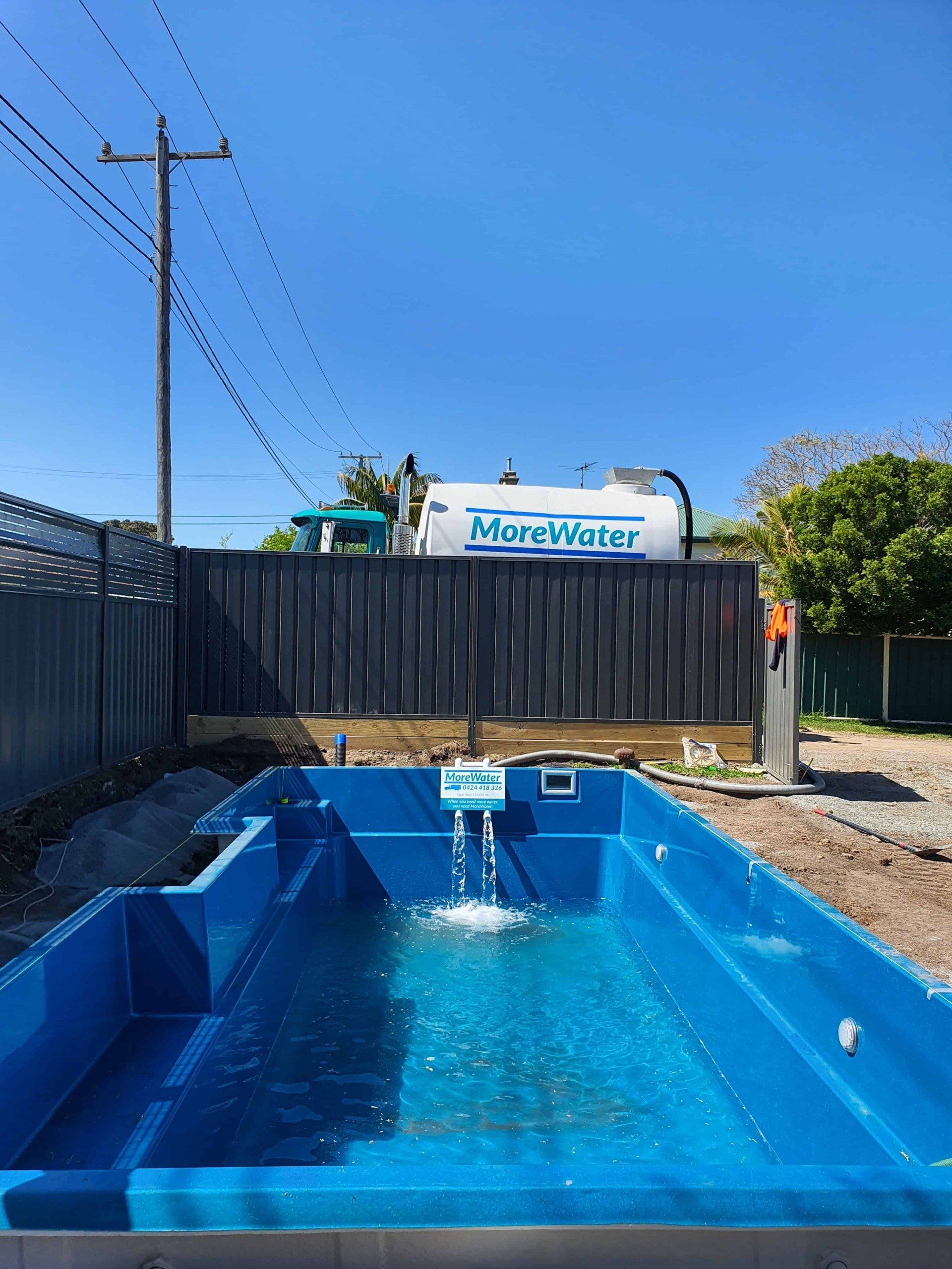 Water Truck Filling Residential Pool