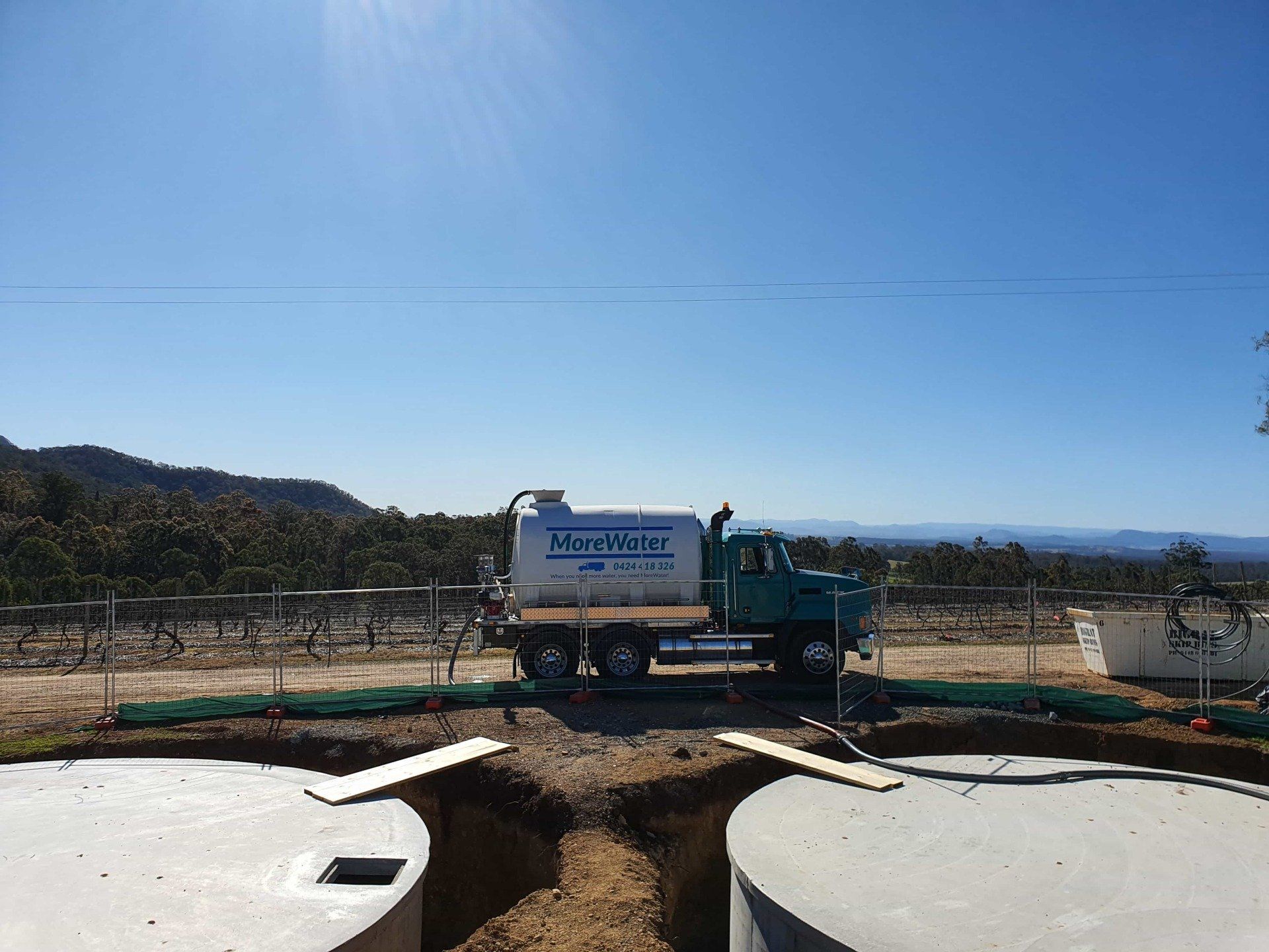 Water Truck Filling Up Water Tanks
