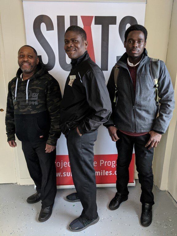 Men before suit donation