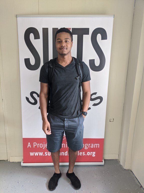 Man before suit donation