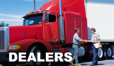Two men shaking hands in front of a red semi truck with the words dealers below it