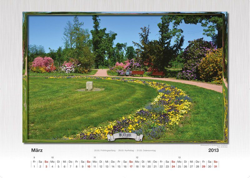 Ein Kalender mit einem Gartenbild und dem Jahr 2013