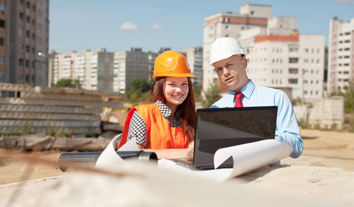 portrait of engineers in construction site