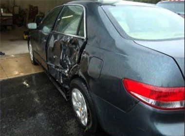 Broken Car Door — Findlay, OH — Findlay Body Repair Co. LTD Broken Car Door — Findlay, OH — Findlay Body Repair Co. LTD