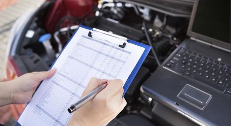 Man Estimating the Cost — Findlay, OH — Findlay Body Repair Co. LTD