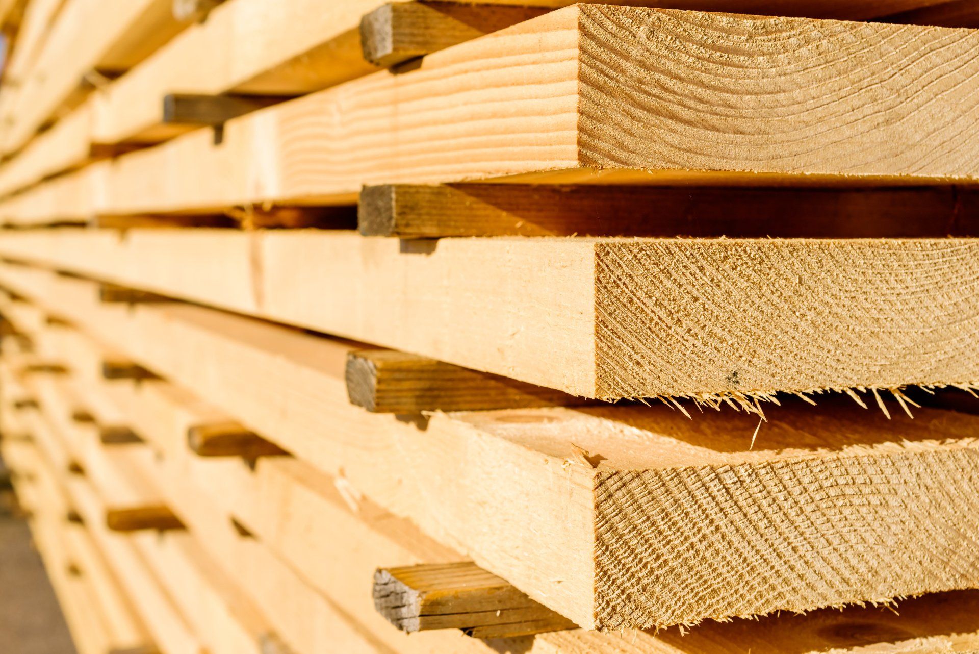A stack of wooden boards sitting on top of each other.