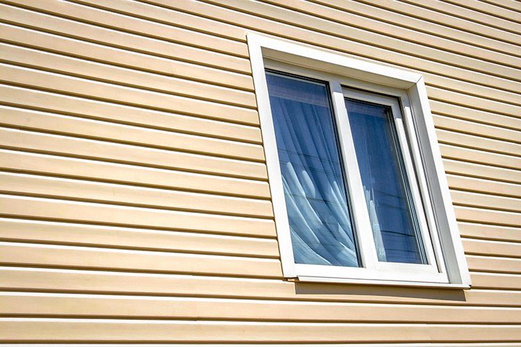 House Siding — Siding on a Beige Color Wall in Duluth, GA House Siding — Siding on a Beige Color Wall in Duluth, GA