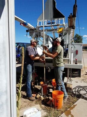 Some Workers Doing Pump Maintenance Services in Elizabeth, Co Some Workers Doing Pump Maintenance Services in Elizabeth, Co