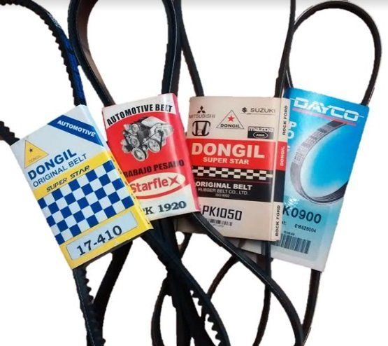 Cuatro cinturones automotrices con etiquetas: marcas Dongil, Starflex y Dayco.