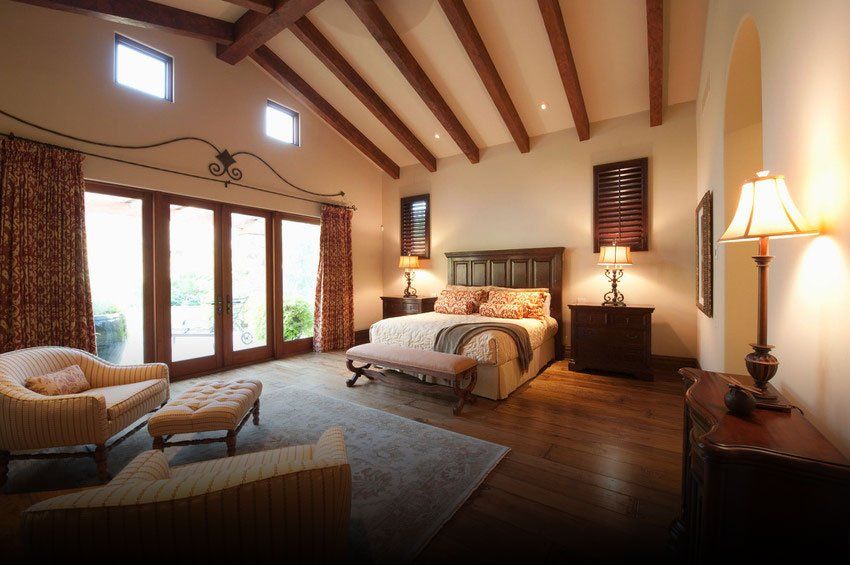 Spacious high beamed bedroom