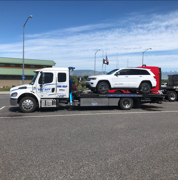 Tow Truck Near Me — Muddy Truck On Parking Lot in Gallatin County, MT