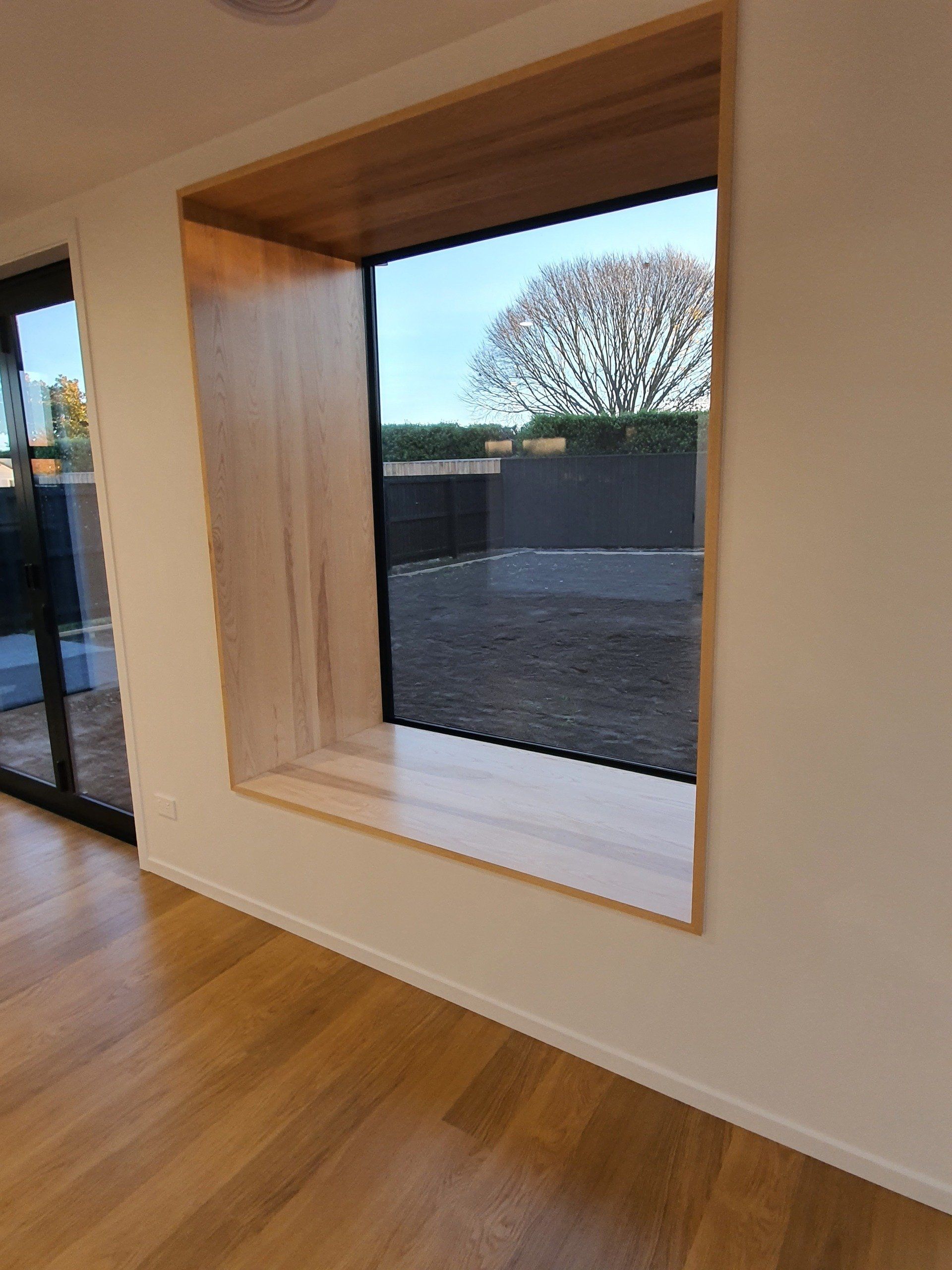 There is a large window in the middle of the room.