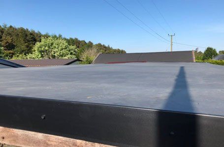 Flat roofing