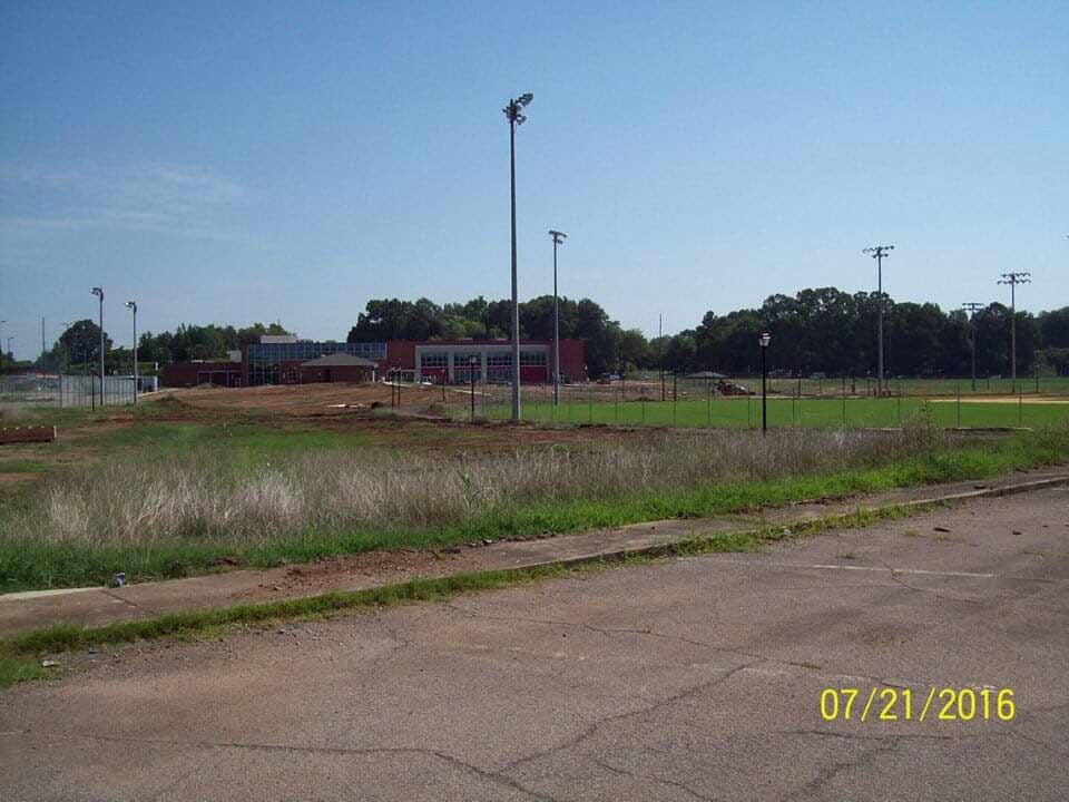 Excavating on the grass field - construction site prep in Bessemer, Al