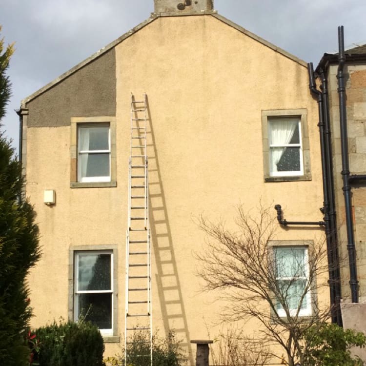 Cream coloured semi-detached house