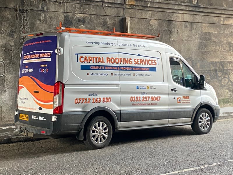 Capital roofing services silver van