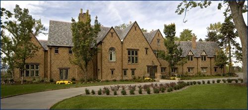 brown house with sloped roofs
