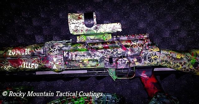 Zombie-themed rifle with camouflage paint, scope, and