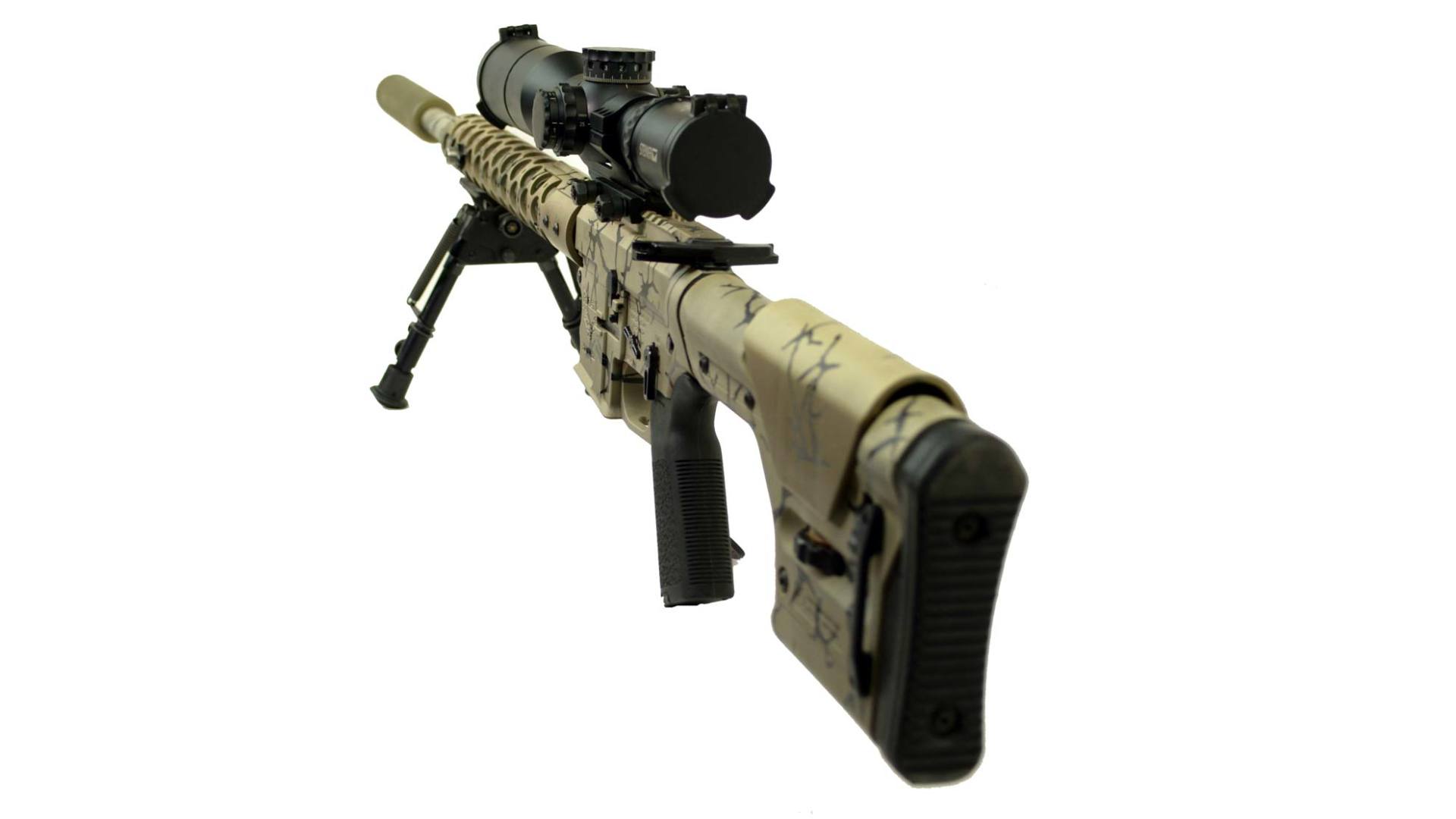 Tan camouflage sniper rifle with scope and bipod.