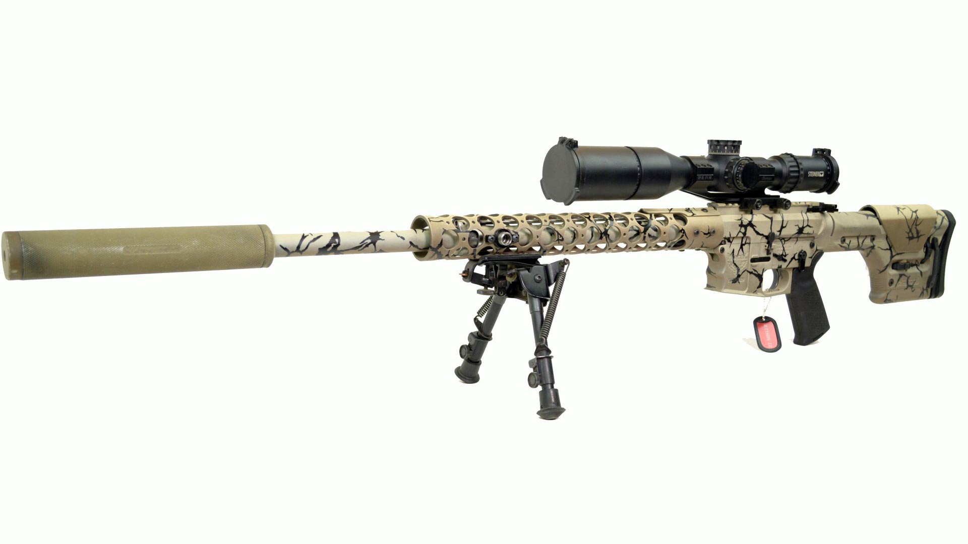 Tan camouflage sniper rifle with scope and silencer on a white background.