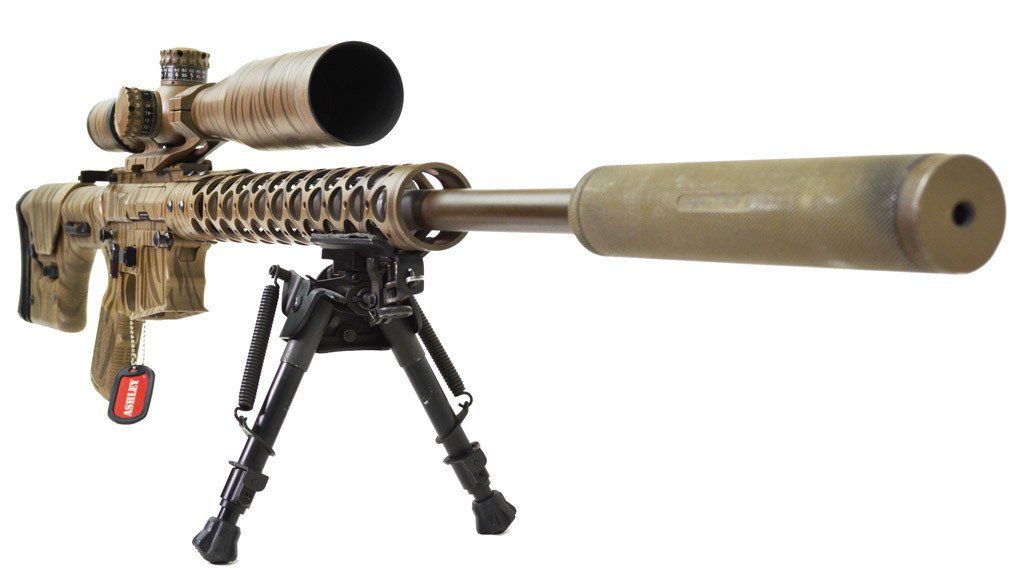 Camouflaged sniper rifle with scope, bipod, and suppressor.
