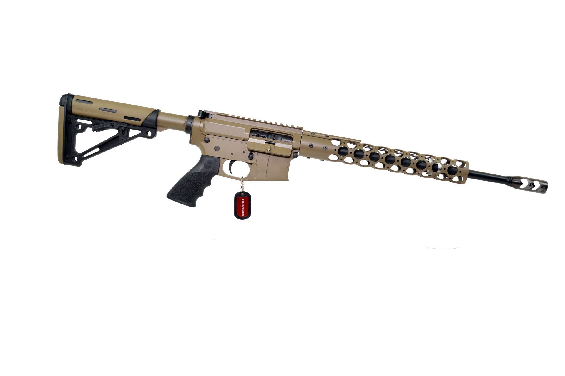 Tan and black AR-15-style rifle on a white background, with a skeletonized handguard and muzzle brake.